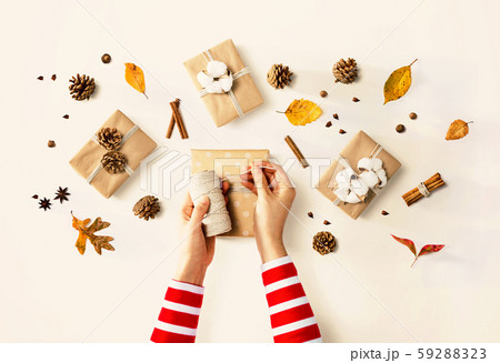 Person making present boxes Person making present boxes 59288323