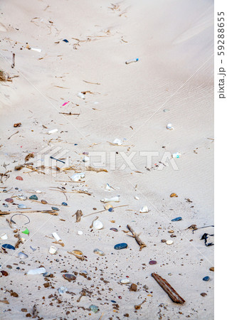 Trash plastic pollution at sandy beach seashore resort 59288655