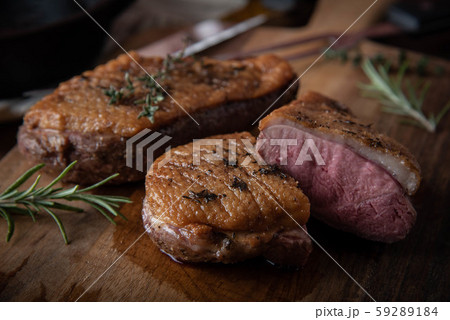 grilled duck breast meat with skillet grilled duck breast meat with skillet 59289184
