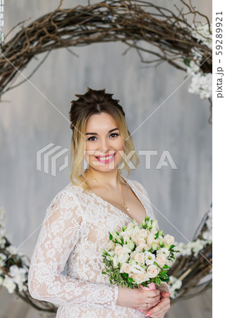 Beautiful woman in wedding dress in photo studio. Beautiful woman in wedding dress in photo studio. 59289921