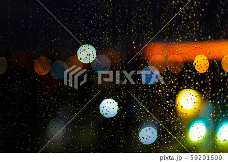 Water drop at windows and bokeh of city in sunset 59291699