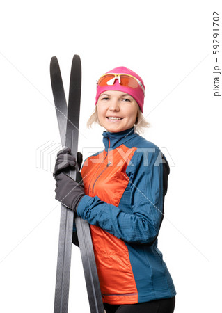 Image of smiling sportswoman with skis on empty white background. 59291702