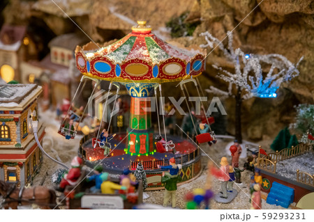 Amusement park in miniature with carousels in winter 59293231
