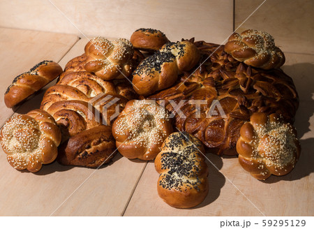 Different bakery products on a wooden background 59295129