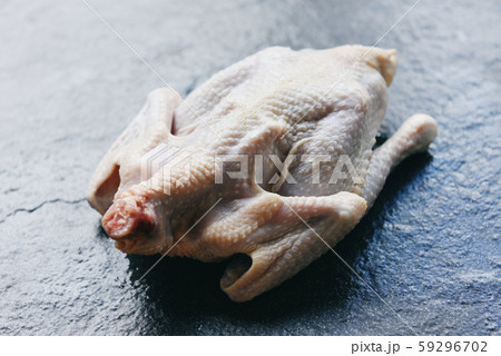 Raw chicken on black background - Organic chicken Raw chicken on black background - Organic chicken 59296702