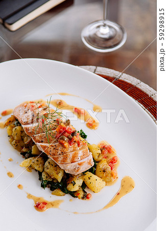 Grill chicken breast with baked potato and kale Grill chicken breast with baked potato and kale 59298915