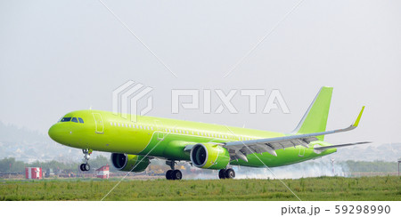 airport airplane landing green runway one modern 59298990