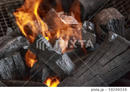 Charcoal and ash burning in the grill Charcoal and ash burning in the grill 59299339