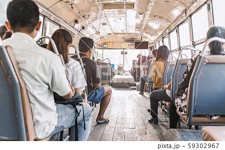 back view on the local economy bus in bangkok 59302967