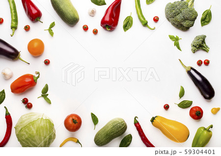Frame of colored organic vegetables on white Frame of colored organic vegetables on white 59304401