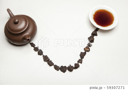 teapot cup white leather background  59307271