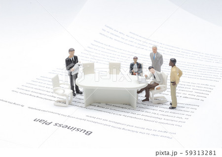 a mini Business People Analyzing The Agenda 59313281
