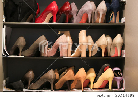 tokyo, Japan, 11/04/2019 , New high heels shoes on a closet with newspaper on bottom. tokyo, Japan, 11/04/2019 , New high heels shoes on a closet with newspaper on bottom. 59314998