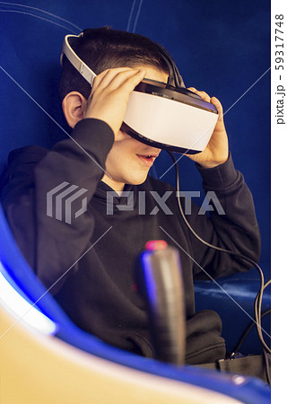 Child watching movie with VR glasses. Special 59317748