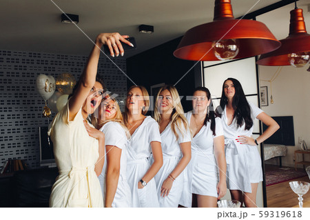 Beautiful happy girls gathering together for 59319618