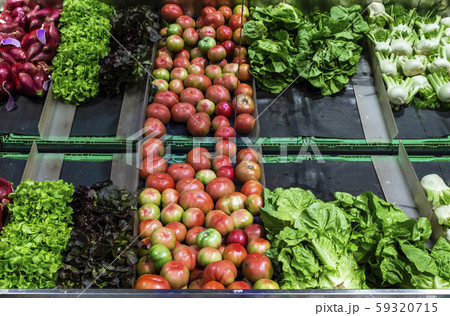 Vegetables on shelf in supermarket. Vegetables on shelf in supermarket. 59320715