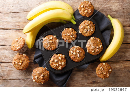 Dietary healthy banana walnuts muffins close-up in 59322647