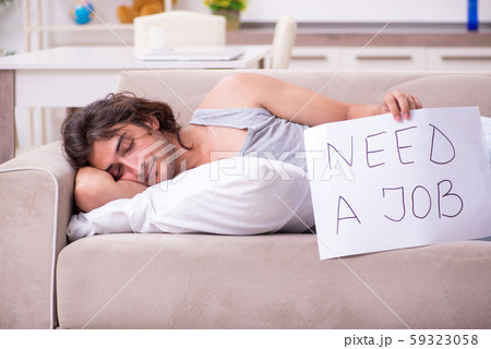 Unemployed man desperate at home 59323058