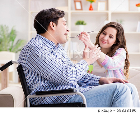 The young family taking care of each other The young family taking care of each other 59323190
