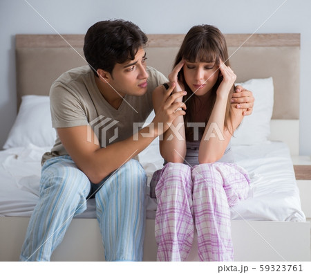Woman and man in the bedroom Woman and man in the bedroom 59323761
