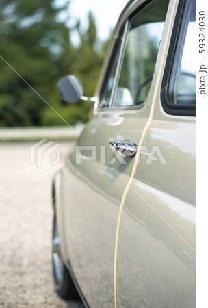 Vintage beige color car. Small old car. Italian 59324030
