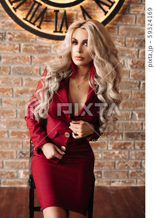 Gorgeous blonde woman in bright black dress on Gorgeous blonde woman in bright black dress on 59324169