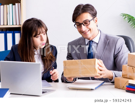 Business people receiving new mail and parcels Business people receiving new mail and parcels 59324243