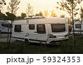 Caravans and campers on green meadow in campsite. 59324353