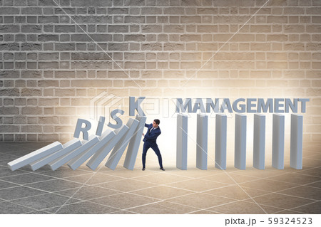 Businessman in risk management concept Businessman in risk management concept 59324523