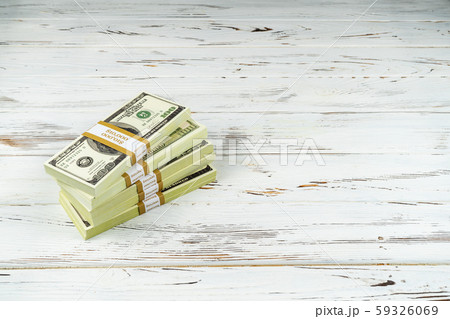 Fifty thousand dollars cash on white rustic background Fifty thousand dollars cash on white rustic background 59326069
