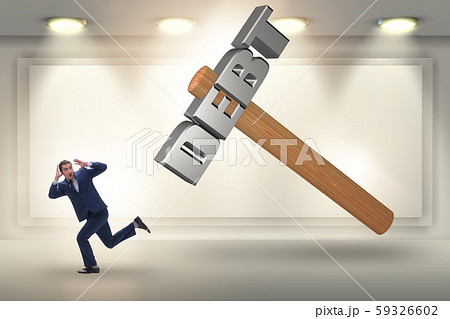 Businessman under the burden of debt and loan 59326602