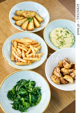 Different side dishes. Variety of dishes on the table. Restaurant menu. Different side dishes. Variety of dishes on the table. Restaurant menu. 59326829