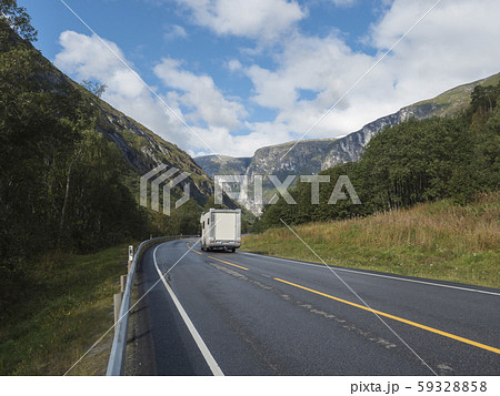 White camper van car at Winding road E136 with 59328858