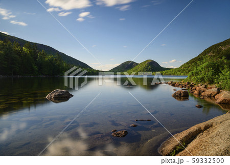 Rocks in Jordan Pond by hills in Acadia National Park, Maine, USA Rocks in Jordan Pond by hills in Acadia National Park, Maine, USA 59332500