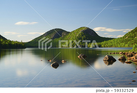 Rocks in Jordan Pond by hills in Acadia National Park, Maine, USA 59332529