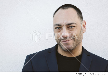 Portrait of mature man with stubble 59332655