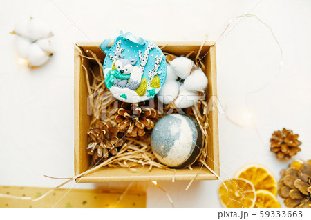 Christmas time. Process of packing gifts for holidays 59333663