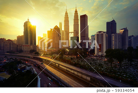 Sunrise in Kuala Lumpur with the silhouette of the Kuala Lumpur city Sunrise in Kuala Lumpur with the silhouette of the Kuala Lumpur city 59334054