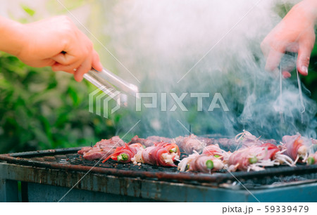 Bacon roll with enoki mushroom grilled Bacon roll with enoki mushroom grilled 59339479