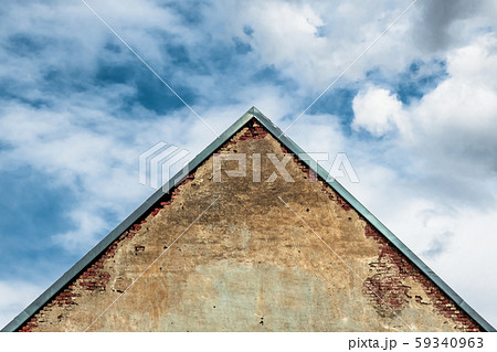 Old Austrian brick roof house building in European architecture style against the sky. Old Austrian brick roof house building in European architecture style against the sky. 59340963