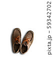 rustic old brown leather shoe isolated 59342702