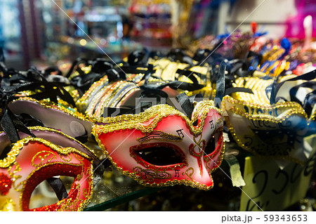 Carnival masks in souvenir shop of Venice 59343653