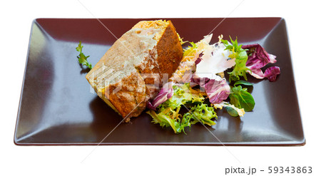 Leek pie with sauce and greens 59343863