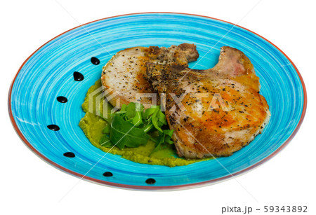 Fried pork loin with green puree 59343892