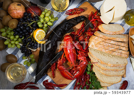 Still life with delicious seafood, wine, cheese and bread 59343977