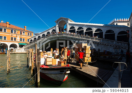 Panorama of Grand canal with boats and gondolas on sunny summer day in Venice. Italy Panorama of Grand canal with boats and gondolas on sunny summer day in Venice. Italy 59344015