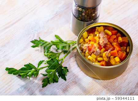 Milanese tuna salad with corn and boiled carrot in tin can Milanese tuna salad with corn and boiled carrot in tin can 59344111