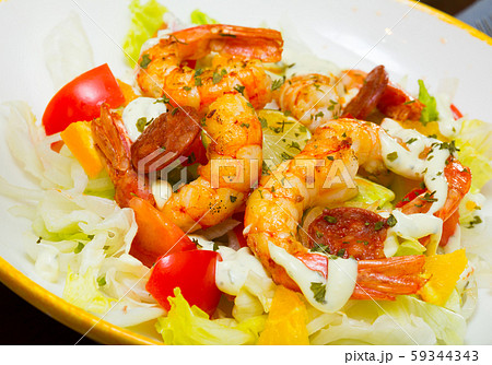 Salad with roasted shrimps and chorizo 59344343