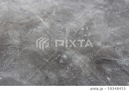 Texture of a grey stone background. Dark Cement and concrete texture, selective focus. Texture of a grey stone background. Dark Cement and concrete texture, selective focus. 59348453
