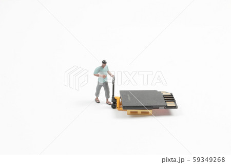 A Mini Worker Working On Sd Card. 59349268
